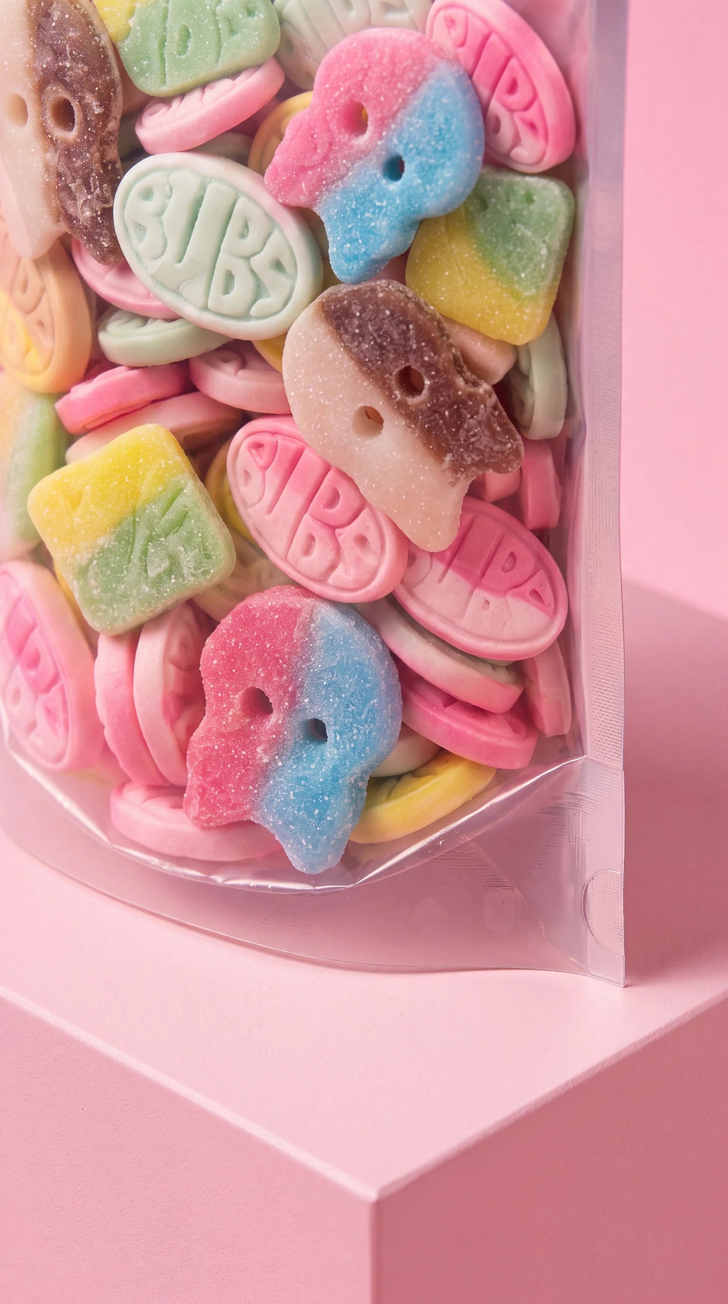 Bonbons Mix Bubs en sachet, formes animales pastels (rose, bleu, jaune, vert).